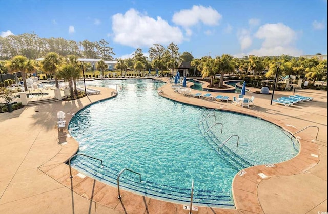 1348 Peterson St, Myrtle Beach, SC 29577 - community pool with a patio area