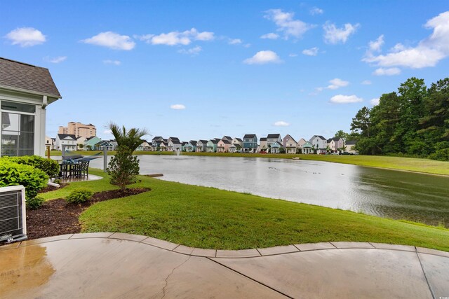 5304 Sea Coral Way N, Myrtle Beach, SC 29582 - view of green lawn with a residential view and a water view