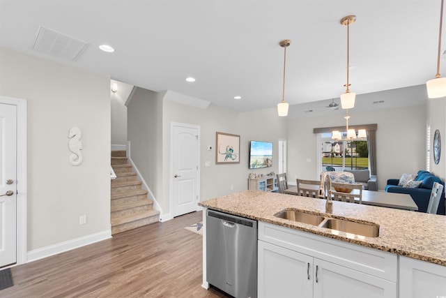 5304 Sea Coral Way N, Myrtle Beach, SC 29582 - kitchen featuring stainless steel dishwasher, white cabinetry, light stone countertops, light wood finished floors, and recessed lighting