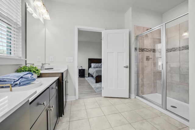 2557 Pete Dye Dr Unit 803, North Myrtle Beach, SC 29582 - ensuite bathroom with vanity, a stall shower, and tile patterned floors