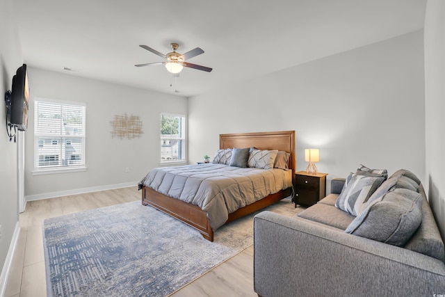 2557 Pete Dye Dr Unit 803, North Myrtle Beach, SC 29582 - bedroom with multiple windows, light wood-style floors, and ceiling fan