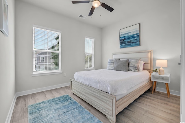 2557 Pete Dye Dr Unit 803, North Myrtle Beach, SC 29582 - bedroom with light wood-type flooring and a ceiling fan