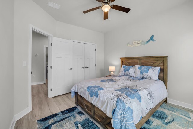 2557 Pete Dye Dr Unit 803, North Myrtle Beach, SC 29582 - bedroom with wood finished floors, a closet, and a ceiling fan