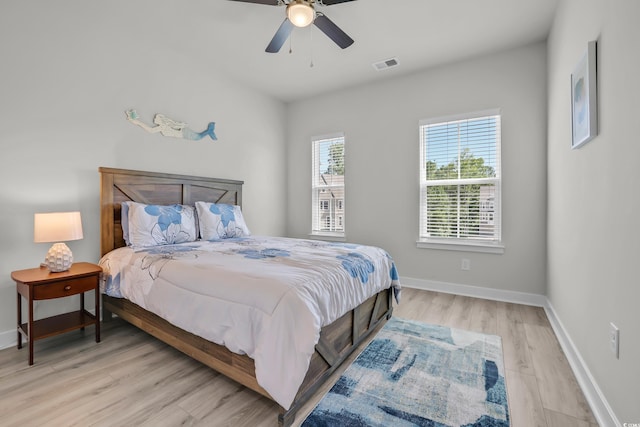 2557 Pete Dye Dr Unit 803, North Myrtle Beach, SC 29582 - bedroom with light wood finished floors and a ceiling fan