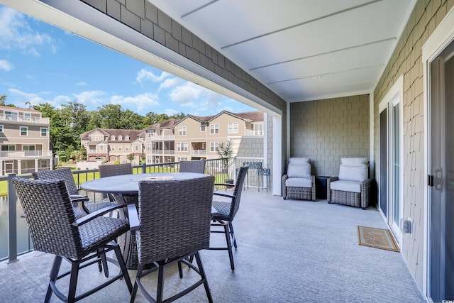 2557 Pete Dye Dr Unit 803, North Myrtle Beach, SC 29582 - balcony with a residential view and outdoor dining space