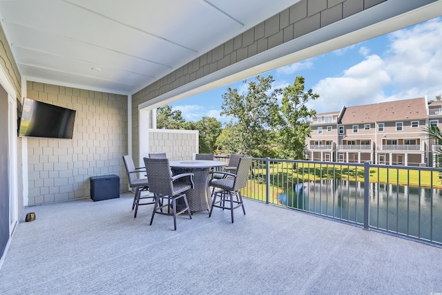 2557 Pete Dye Dr Unit 803, North Myrtle Beach, SC 29582 - patio / terrace with outdoor dining area and a water view