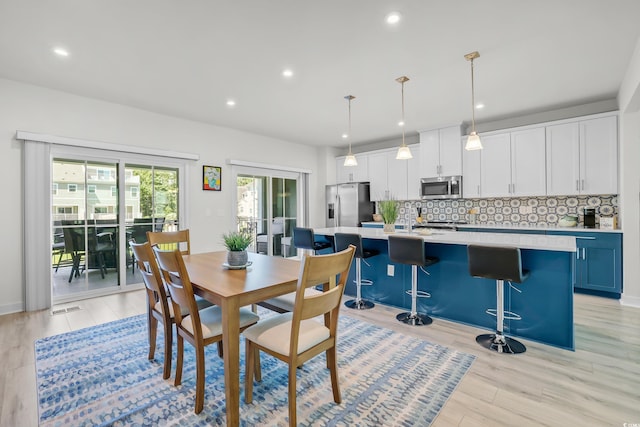 2557 Pete Dye Dr Unit 803, North Myrtle Beach, SC 29582 - dining area with recessed lighting and light wood-style floors
