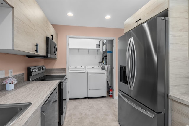 251 Myrtle Greens Dr Unit B, Conway, SC 29526 - kitchen featuring appliances with stainless steel finishes, independent washer and dryer, light countertops, light brown cabinets, and recessed lighting
