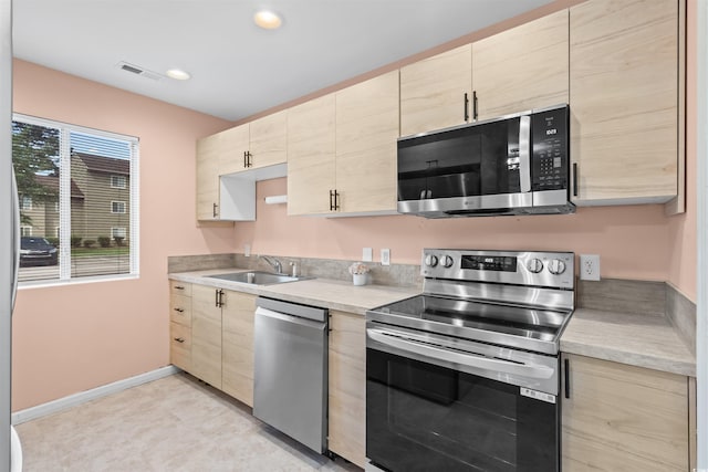 251 Myrtle Greens Dr Unit B, Conway, SC 29526 - kitchen with appliances with stainless steel finishes, light brown cabinetry, light countertops, and recessed lighting