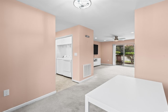 251 Myrtle Greens Dr Unit B, Conway, SC 29526 - unfurnished living room featuring carpet floors, a ceiling fan, washing machine and clothes dryer, and recessed lighting