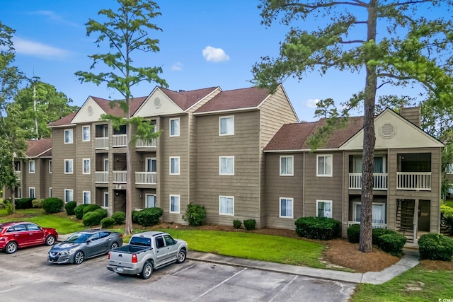251 Myrtle Greens Dr Unit B, Conway, SC 29526 - view of building exterior with uncovered parking