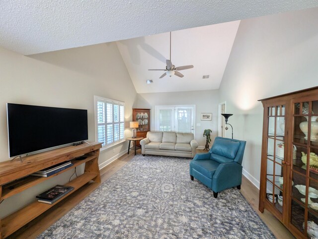 50 Pawleys Place Dr Unit 50, Pawleys Island, SC 29585 - living room with ceiling fan, wood finished floors, high vaulted ceiling, and a textured ceiling