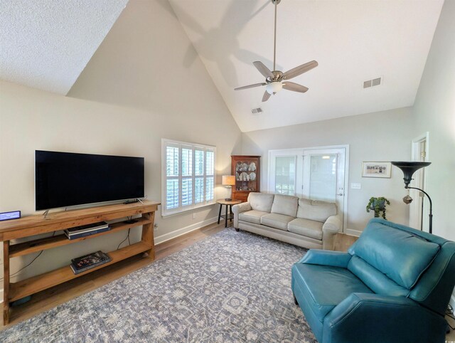 50 Pawleys Place Dr Unit 50, Pawleys Island, SC 29585 - living room with high vaulted ceiling, wood finished floors, and ceiling fan