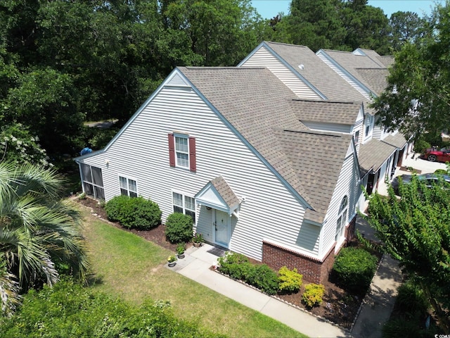 50 Pawleys Place Dr Unit 50, Pawleys Island, SC 29585 - view of front of house with roof with shingles and a front yard