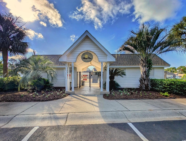50 Pawleys Place Dr Unit 50, Pawleys Island, SC 29585 - view of front of home with a gate and roof with shingles
