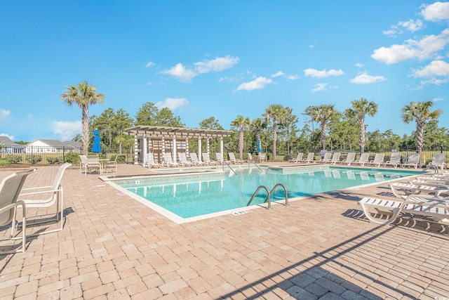 3619 White Wing Cir, Myrtle Beach, SC 29579 - community pool featuring a patio and a pergola