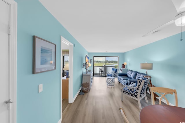 312 42nd Ave N Unit B2, North Myrtle Beach, SC 29582 - living area featuring light wood-type flooring and baseboards