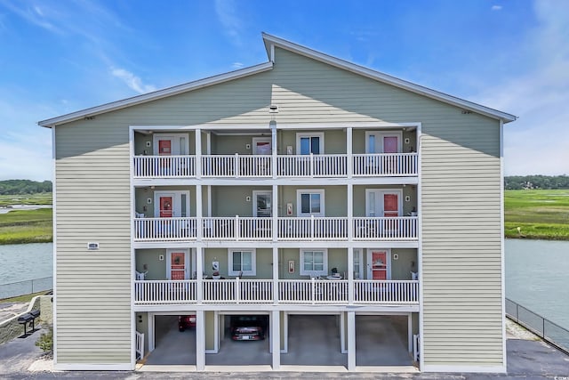 312 42nd Ave N Unit B2, North Myrtle Beach, SC 29582 - view of building exterior with a water view