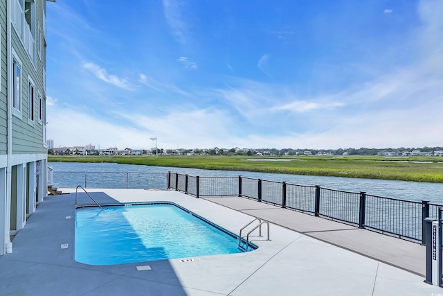 312 42nd Ave N Unit B2, North Myrtle Beach, SC 29582 - community pool featuring a water view and a patio area