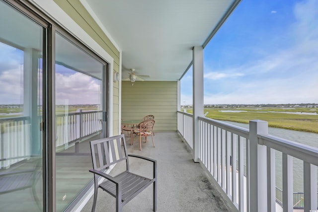 312 42nd Ave N Unit B2, North Myrtle Beach, SC 29582 - balcony featuring a water view, ceiling fan, and view of golf course