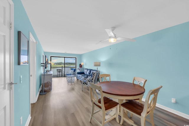 312 42nd Ave N Unit B2, North Myrtle Beach, SC 29582 - dining room with wood finished floors and ceiling fan