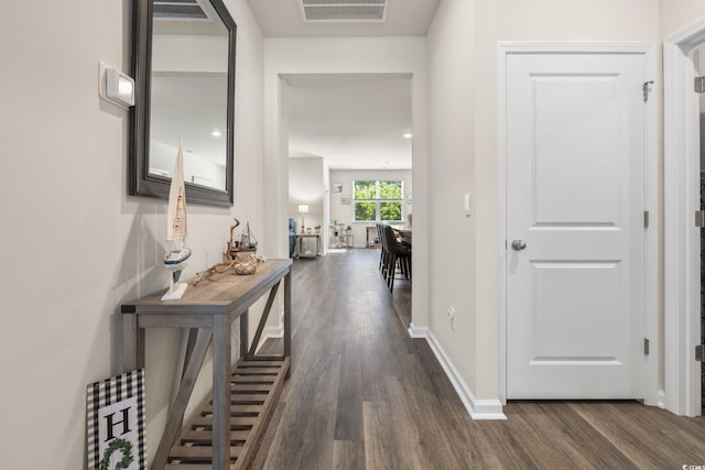 688 Wallace Dr, Little River, SC 29566 - corridor featuring dark wood-type flooring and baseboards