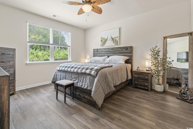 688 Wallace Dr, Little River, SC 29566 - bedroom with wood finished floors and ceiling fan