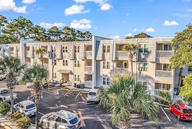 401 Hillside Dr N Unit 2F, North Myrtle Beach, SC 29582 - view of apartment building / complex with uncovered parking