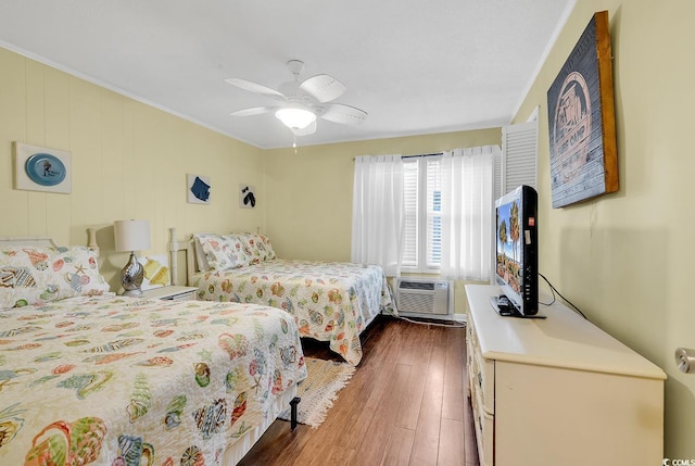 401 Hillside Dr N Unit 2F, North Myrtle Beach, SC 29582 - bedroom featuring hardwood / wood-style flooring, ceiling fan, crown molding, and a wall mounted AC