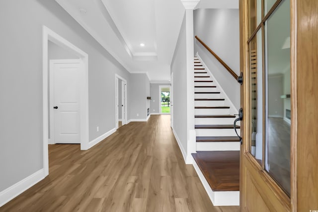 529 Oak Lawn Rd, Georgetown, SC 29440 - foyer featuring light wood-type flooring, stairs, crown molding, and recessed lighting