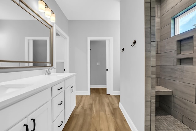 529 Oak Lawn Rd, Georgetown, SC 29440 - bathroom with double vanity, wood finished floors, and walk in shower