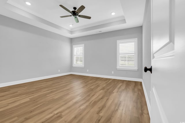 529 Oak Lawn Rd, Georgetown, SC 29440 - unfurnished room with a tray ceiling, healthy amount of natural light, light wood-style flooring, crown molding, and recessed lighting
