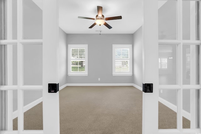 529 Oak Lawn Rd, Georgetown, SC 29440 - carpeted spare room featuring baseboards and ceiling fan