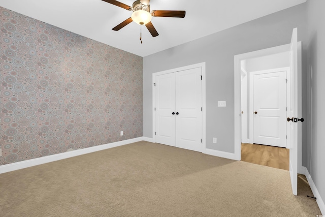 529 Oak Lawn Rd, Georgetown, SC 29440 - unfurnished bedroom featuring carpet flooring, a closet, and a ceiling fan
