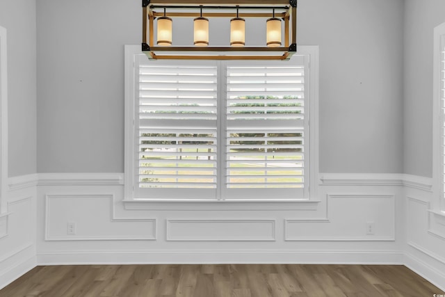 529 Oak Lawn Rd, Georgetown, SC 29440 - detailed view of wainscoting, a decorative wall, and wood finished floors
