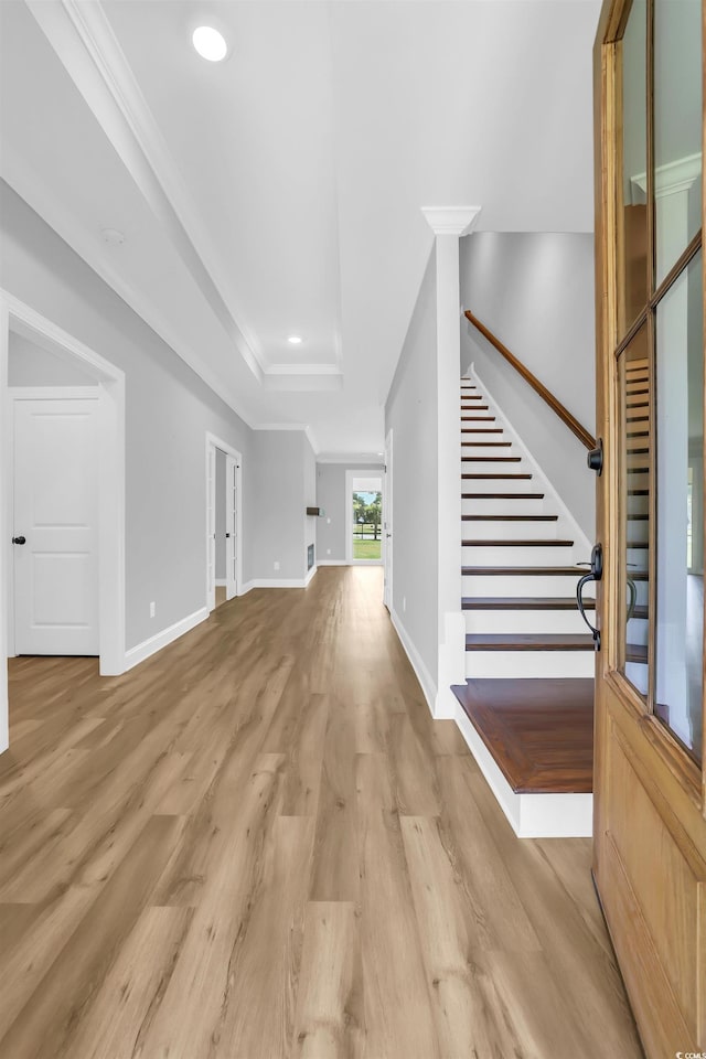 529 Oak Lawn Rd, Georgetown, SC 29440 - entrance foyer featuring stairs, light wood-type flooring, a raised ceiling, recessed lighting, and ornamental molding