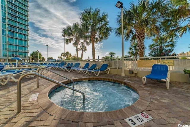300 N Ocean Blvd Unit 1213, North Myrtle Beach, SC 29582 - view of swimming pool featuring a hot tub