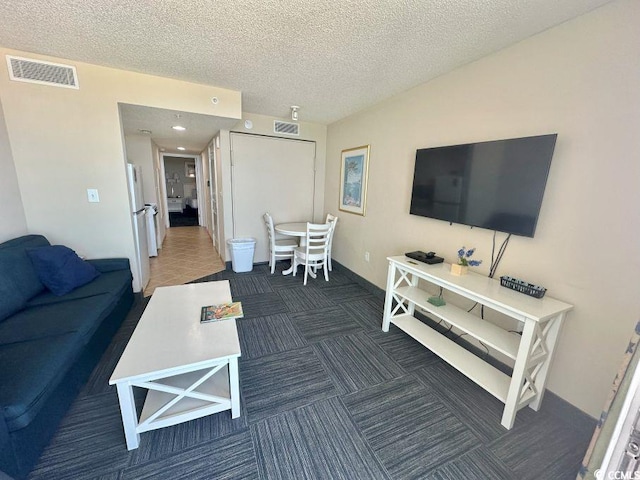 300 N Ocean Blvd Unit 1213, North Myrtle Beach, SC 29582 - carpeted living area with a textured ceiling and recessed lighting