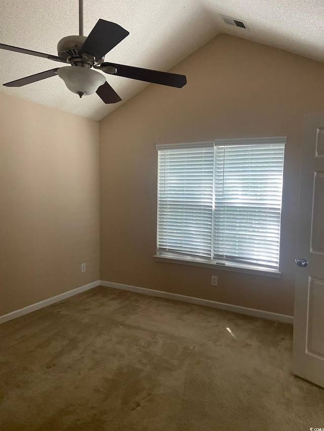 110 Palisade Loop Unit 110, Pawleys Island, SC 29585 - carpeted spare room featuring vaulted ceiling, a textured ceiling, and ceiling fan