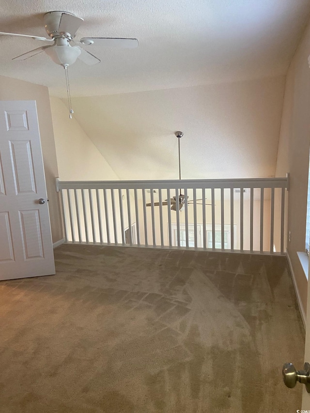 110 Palisade Loop Unit 110, Pawleys Island, SC 29585 - unfurnished room with ceiling fan, carpet floors, and lofted ceiling