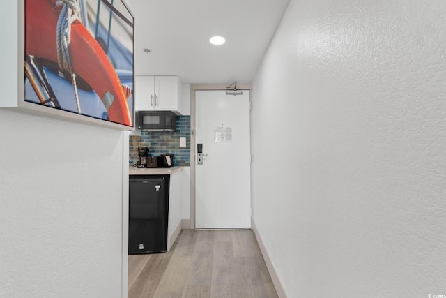 2311 S Ocean Blvd Unit 143, Myrtle Beach, SC 29577 - corridor featuring light wood-type flooring and recessed lighting