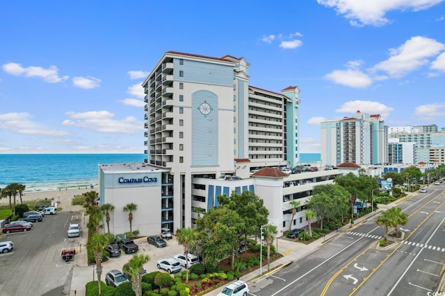 2311 S Ocean Blvd Unit 143, Myrtle Beach, SC 29577 - view of property featuring a water view, uncovered parking, and a view of city