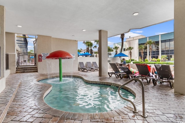 2311 S Ocean Blvd Unit 143, Myrtle Beach, SC 29577 - community pool featuring a patio area and a gate