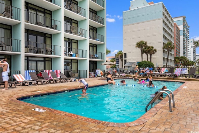 2311 S Ocean Blvd Unit 143, Myrtle Beach, SC 29577 - community pool featuring a patio