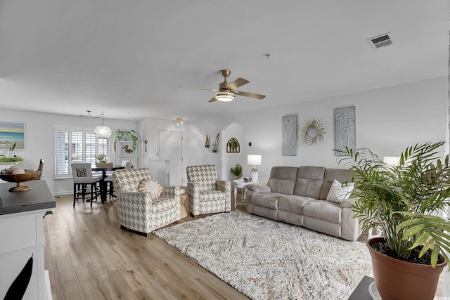 139 Butkus Dr Unit 3, Myrtle Beach, SC 29588 - living area with ceiling fan, light wood-style flooring, and arched walkways