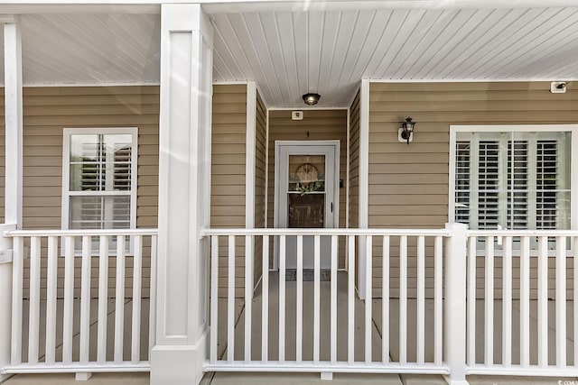 139 Butkus Dr Unit 3, Myrtle Beach, SC 29588 - view of exterior entry with covered porch and a security system