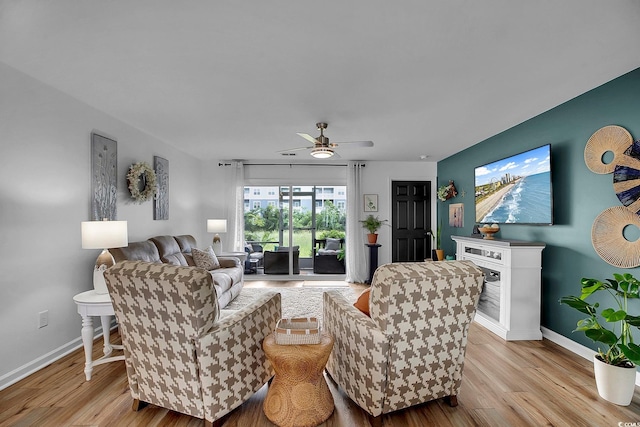139 Butkus Dr Unit 3, Myrtle Beach, SC 29588 - living room with light wood-style flooring and a ceiling fan