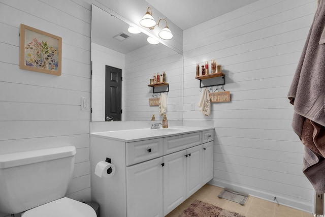 139 Butkus Dr Unit 3, Myrtle Beach, SC 29588 - bathroom featuring vanity, tile patterned flooring, and wooden walls