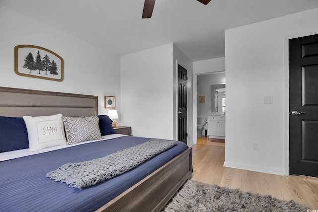 139 Butkus Dr Unit 3, Myrtle Beach, SC 29588 - bedroom with light wood-style flooring, ensuite bath, and ceiling fan