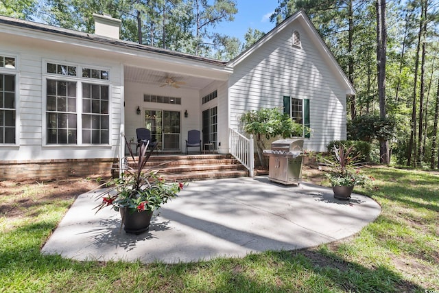 4495 Trotters Ct, Murrells Inlet, SC 29576 - rear view of house featuring ceiling fan, a patio, and a chimney